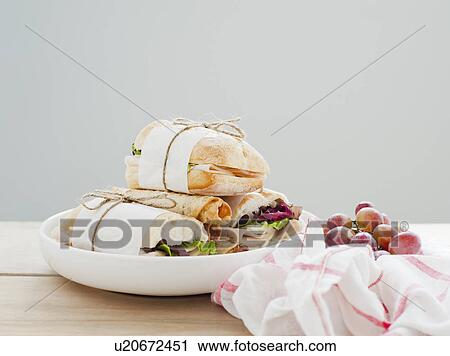 Stock Image - Ciabata and grapes. Fotosearch
