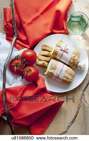 Ciabatta, cookies and tomatoes View Large Photo Image Stock Image - Ciabatta, cookies and tomatoes. Fotosearch
