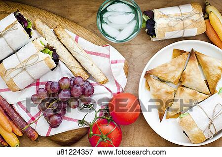 Ciabatta, puffs and fruits View Large Photo Image Stock Photo - Ciabatta, puffs and fruits. Fotosearch