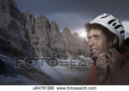 Climber in Brenta Dolomites, Italy, preparing for climb View Large Photo Image Stock Image - Climber in Brenta Dolomites, Italy, preparing for climb. Fotosearch