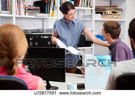 Colleagues in office View Large Photo Image Stock Image - Colleagues in office. Fotosearch