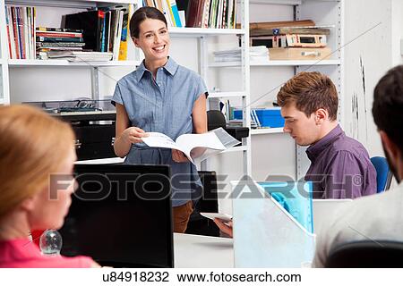 Colleagues in office View Large Photo Image Stock Image - Colleagues in office. Fotosearch