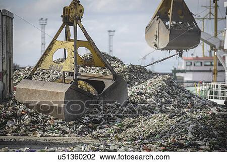 Crane loading recycled glass onto ship View Large Photo Image Stock Image - Crane loading recycled glass onto ship. Fotosearch