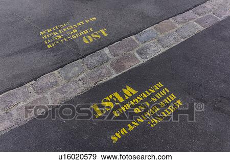 Demarcation line (former Berlin Wall) between former East and West Berlin at Potsdamer Platz, Berlin, Germany View Large Photo Image Stock Photo - Demarcation line (former Berlin Wall) between former East and West Berlin at Potsdamer Platz, Berlin, Germany. Fotosearch
