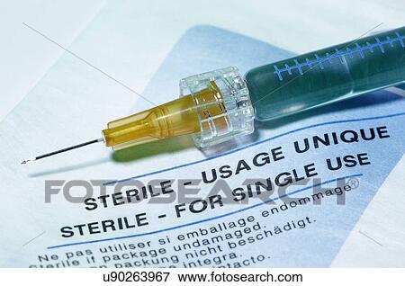 Stock Photo - Disposable plastic medical syringe with a hypodermic needle. Fotosearch