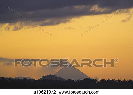 Evening view of Arenal Volcano, La Fortuna, Costa Rica View Large Photo Image Stock Image - Evening view of Arenal Volcano, La Fortuna, Costa Rica. Fotosearch