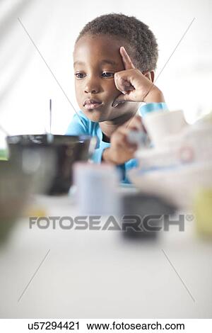 Girl day dreaming in class View Large Photo Image Stock Image - Girl day dreaming in class. Fotosearch