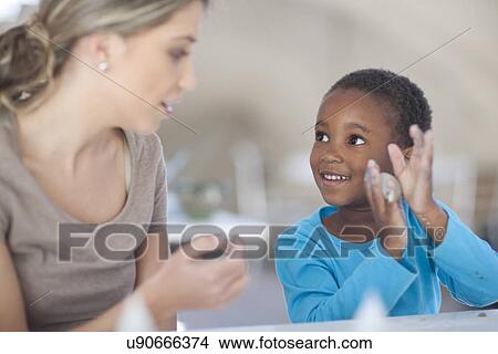 Girl painting in art class View Large Photo Image Picture - Girl painting in art class. Fotosearch