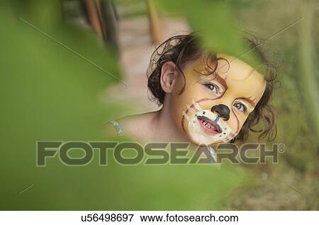 Girl with face painting of animal View Large Photo Image Stock Photo - Girl with face painting of animal. Fotosearch