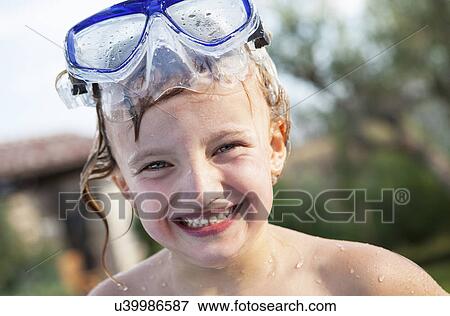 Girl with snorkeling mask on her head View Large Photo Image Stock Photo - Girl with snorkeling mask on her head. Fotosearch