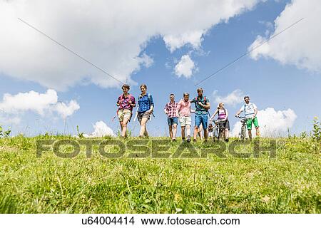 Group of friends hiking, Tyrol, Austria View Large Photo Image Picture - Group of friends hiking, Tyrol, Austria. Fotosearch