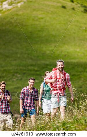 Group of friends hiking, Tyrol, Austria View Large Photo Image Stock Image - Group of friends hiking, Tyrol, Austria. Fotosearch