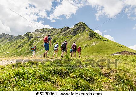 Group of friends hiking, Tyrol, Austria View Large Photo Image Stock Image - Group of friends hiking, Tyrol, Austria. Fotosearch