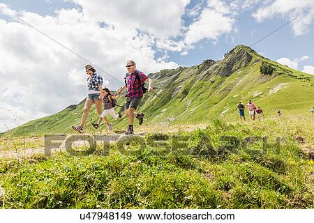 Group of friends hiking, Tyrol, Austria View Large Photo Image Stock Photo - Group of friends hiking, Tyrol, Austria. Fotosearch