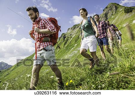 Group of friends hiking, Tyrol, Austria View Large Photo Image Stock Photograph - Group of friends hiking, Tyrol, Austria. Fotosearch