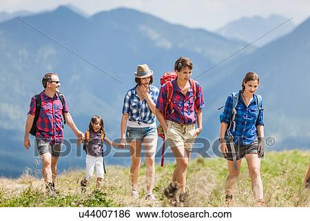 Group of friends hiking, Tyrol, Austria View Large Photo Image Stock Photograph - Group of friends hiking, Tyrol, Austria. Fotosearch