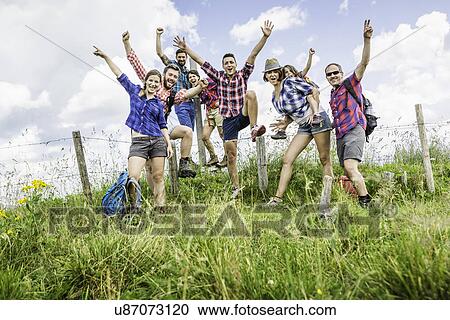 Stock Image - Group of friends on hike, Tyrol, Austria. Fotosearch