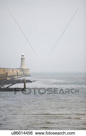 Stock Photograph - Harbour lighthouse, Tynemouth, Tyne and Wear, United Kingdom. Fotosearch