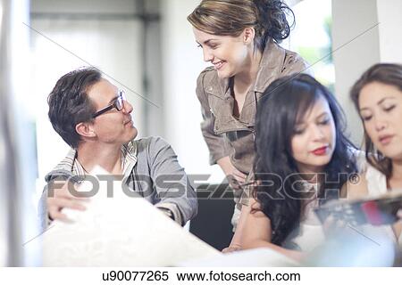 Interior designers sharing ideas View Large Photo Image Stock Photography - Interior designers sharing ideas. Fotosearch