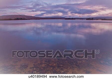 Picture - Loch Tulla at dawn near Glen Coe in Scotland. Fotosearch