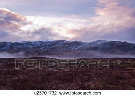Stock Image - Loch Tulla at dawn near Glen Coe in Scotland. Fotosearch