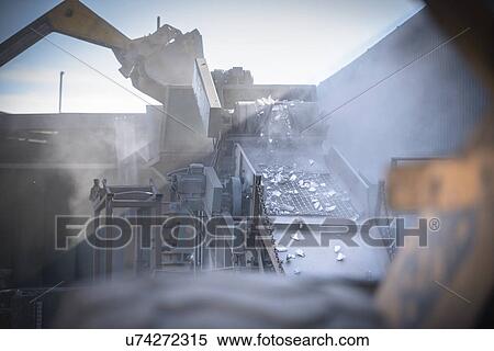 Machinery crushing titanium metal in industrial plant View Large Photo Image Stock Photography - Machinery crushing titanium metal in industrial plant. Fotosearch