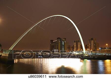 Stock Image - Millenium bridge at night, Newcastle upon Tyne, United Kingdom. Fotosearch