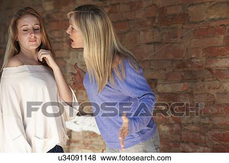 Mother and daughter arguing View Large Photo Image Stock Photo - Mother and daughter arguing. Fotosearch