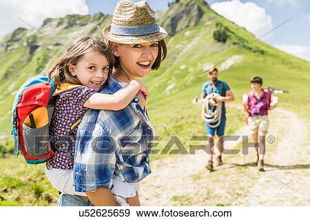 Mother and daughter hiking, Tyrol, Austria View Large Photo Image Stock Photo - Mother and daughter hiking, Tyrol, Austria. Fotosearch