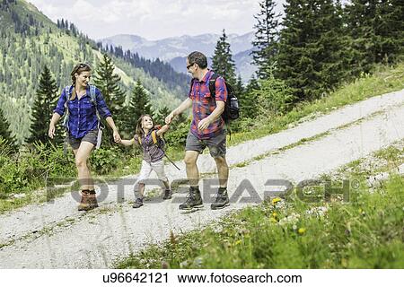 Parents and daughter hiking, Tyrol, Austria View Large Photo Image Stock Image - Parents and daughter hiking, Tyrol, Austria. Fotosearch