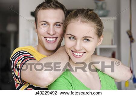 Stock Image - Portrait of couple, smiling. Fotosearch