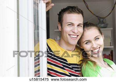 Stock Photography - Portrait of couple, smiling. Fotosearch