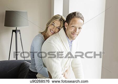 Portrait of mid adult couple, smiling View Large Photo Image Stock Photograph - Portrait of mid adult couple, smiling. Fotosearch