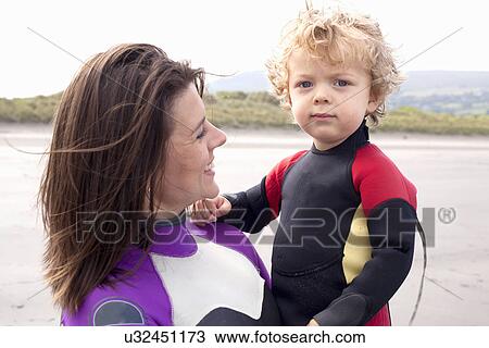 Portrait of mother holding son View Large Photo Image Stock Image - Portrait of mother holding son. Fotosearch