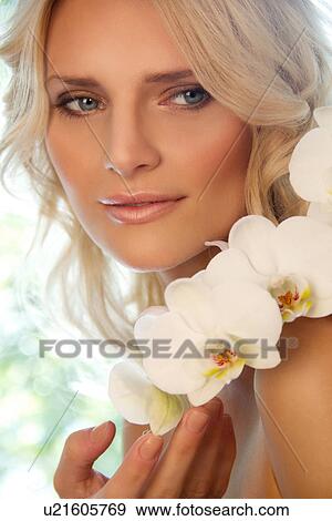 Portrait of woman with orchids View Large Photo Image Stock Photo - Portrait of woman with orchids. Fotosearch