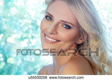 Stock Photo - Portrait of young blonde woman. Fotosearch
