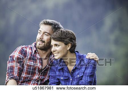 Portrait of young couple, Tyrol Austria View Large Photo Image Stock Image - Portrait of young couple, Tyrol Austria. Fotosearch
