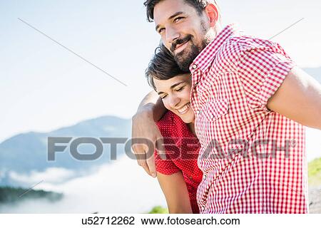 Portrait of young couple, Tyrol, Austria View Large Photo Image Stock Image - Portrait of young couple, Tyrol, Austria. Fotosearch
