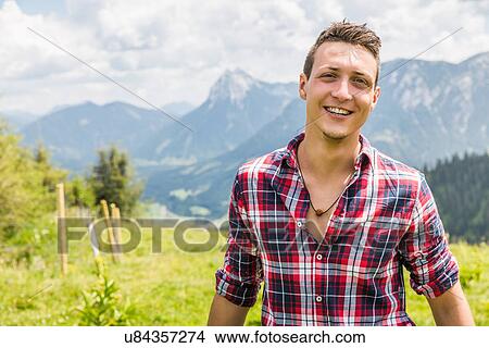 Picture - Portrait of young man, Tyrol, Austria. Fotosearch