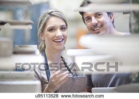 Potters at crockery factory View Large Photo Image Stock Photo - Potters at crockery factory. Fotosearch