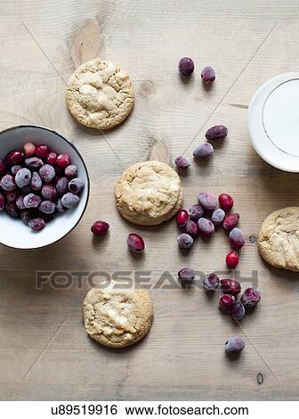 Red berries and cookies View Large Photo Image Stock Photograph - Red berries and cookies. Fotosearch