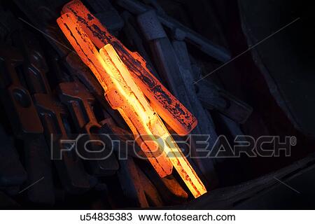 Red hot newly forged straps (mining components) cooling down View Large Photo Image Stock Image - Red hot newly forged straps (mining components) cooling down. Fotosearch