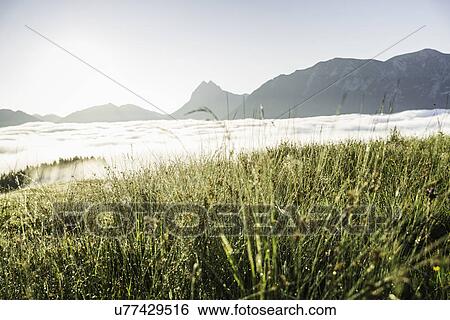 Stock Photograph - Sea of fog, Tirol, Austria. Fotosearch
