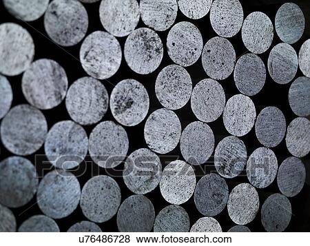 Stock Photo - Stack of round steel billet. Fotosearch