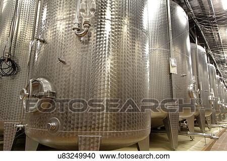 Stainless steel vats on industrial wine cellar View Large Photo Image Stock Image - Stainless steel vats on industrial wine cellar. Fotosearch