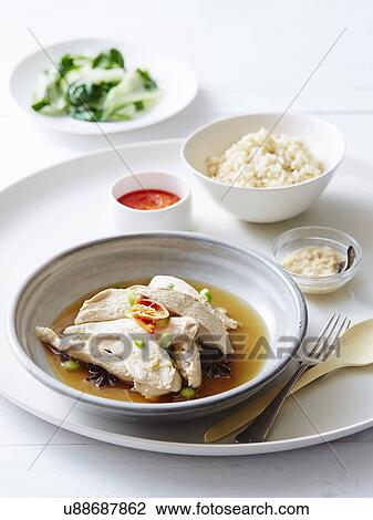 Still life of hainan chicken with steamed rice View Large Photo Image Stock Image - Still life of hainan chicken with steamed rice. Fotosearch
