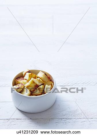 Still life of haloumi croutons in a bowl View Large Photo Image Stock Photo - Still life of haloumi croutons in a bowl. Fotosearch