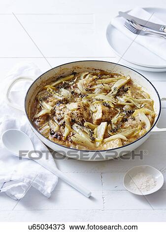 Still life of slow roasted chicken and fennel View Large Photo Image Stock Image - Still life of slow roasted chicken and fennel. Fotosearch