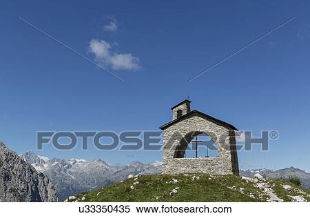 Stock Photography - Stone chapel in the mountains, Brenta Dolomites, Italy. Fotosearch