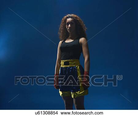 Studio portrait of female boxer in hand bandages View Large Photo Image Picture - Studio portrait of female boxer in hand bandages. Fotosearch